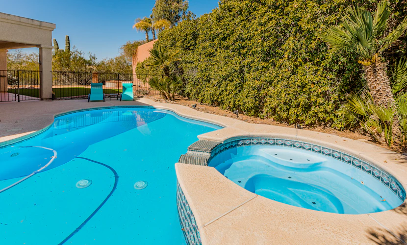 Dog-friendly golf course home with pool, spa, pool table, WiFi & Peloton