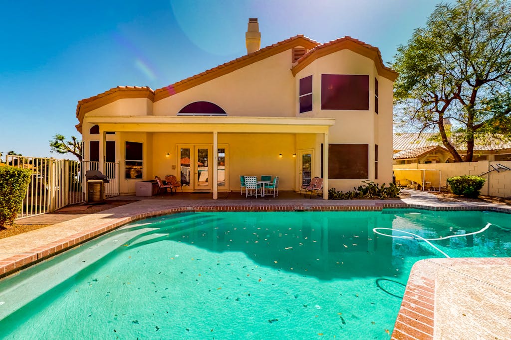 Lakefront home with private pool, kayak, cornhole, & pool table