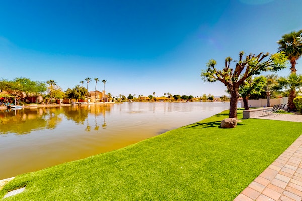 Lakefront home with private pool, kayak, cornhole, & pool table