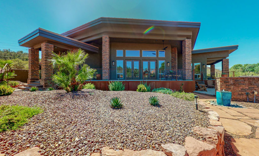 Custom luxury home with Cathedral Rock views, outdoor living, hot tub, & firepit