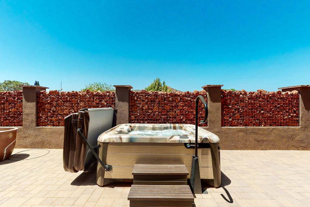 Custom luxury home with Cathedral Rock views, outdoor living, hot tub, & firepit