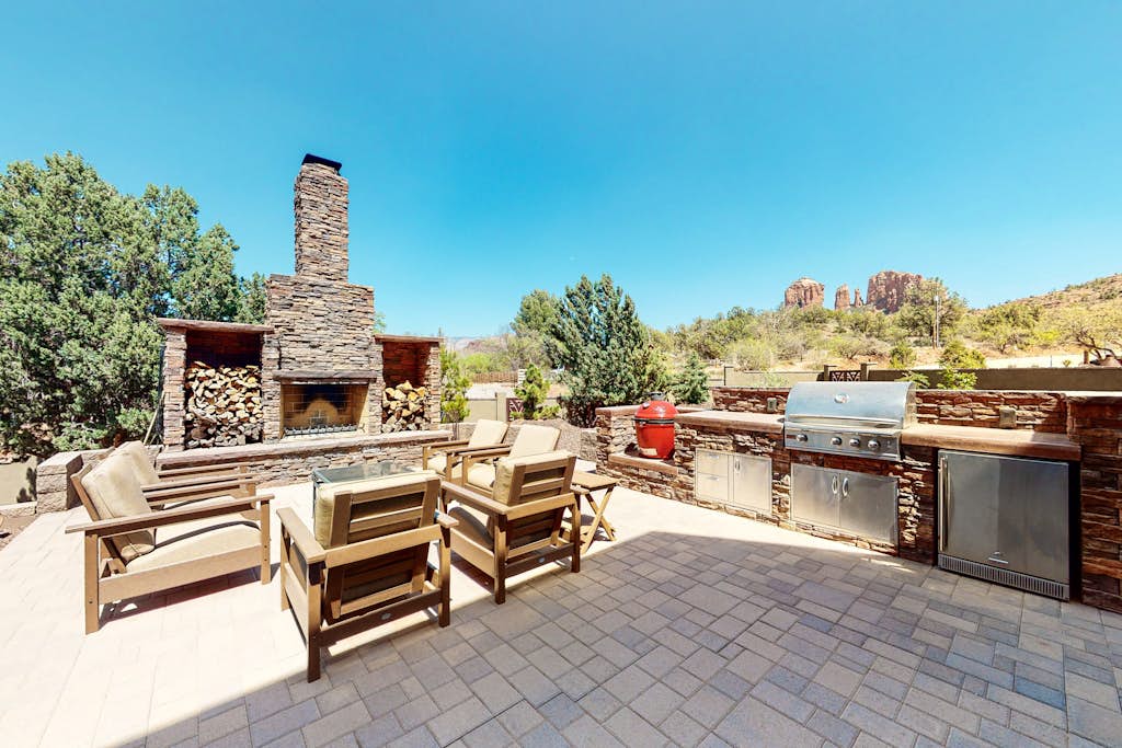 Custom luxury home with Cathedral Rock views, outdoor living, hot tub, & firepit