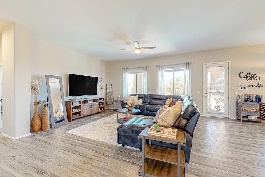 Snowbird-friendly home with WiFi, central AC, enclosed yard, pool, and patio