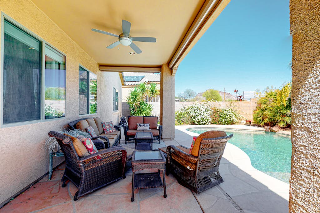 Snowbird-friendly home with WiFi, central AC, enclosed yard, pool, and patio