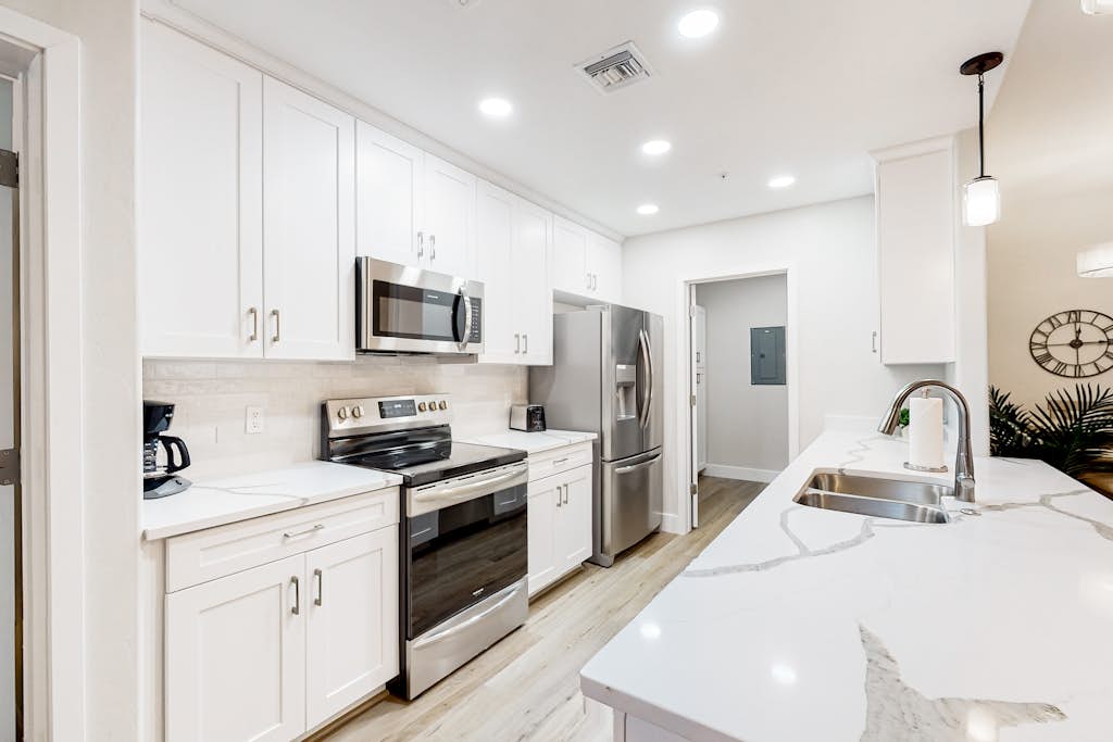 Dog-friendly condo with pool, washer/dryer - riverwalk path to restaurants