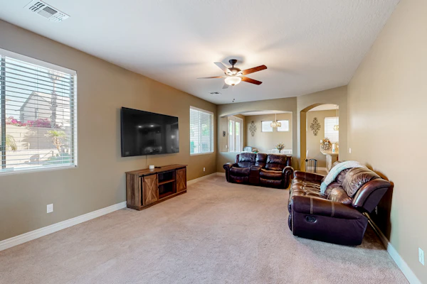 Spacious home surrounded by palms with pool, grill, children's items, & W/D