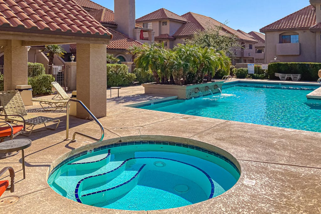 Two-level condo with loft bedroom, pool & hot tub, central A/C