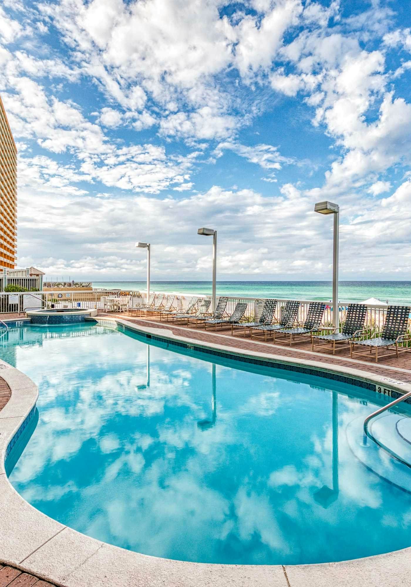 Gulf Front condo with Pools, Beach access and Gym