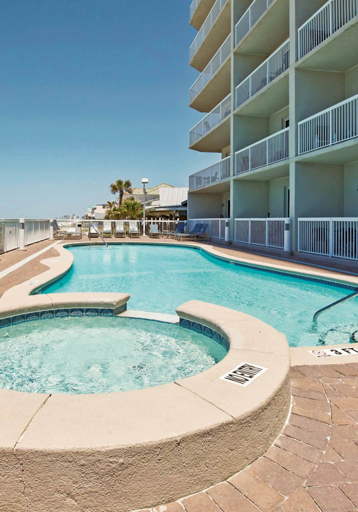 Gulf Front condo with Pools, Beach access and Gym