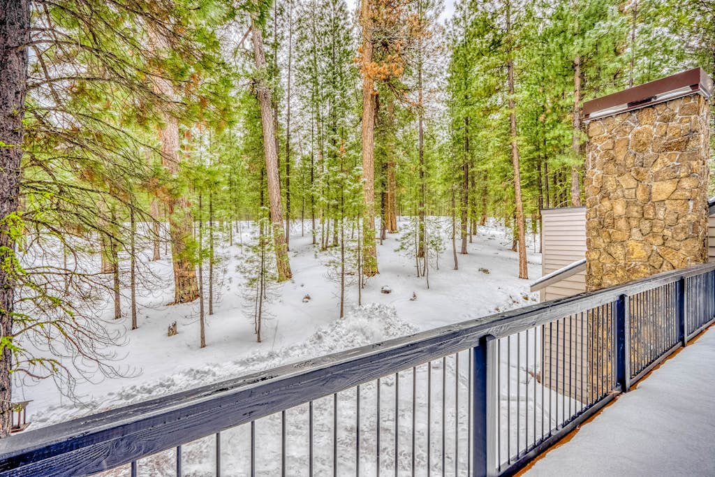 All-season resort home with on-site pool, hot tub, gym, golf, & fireplaces