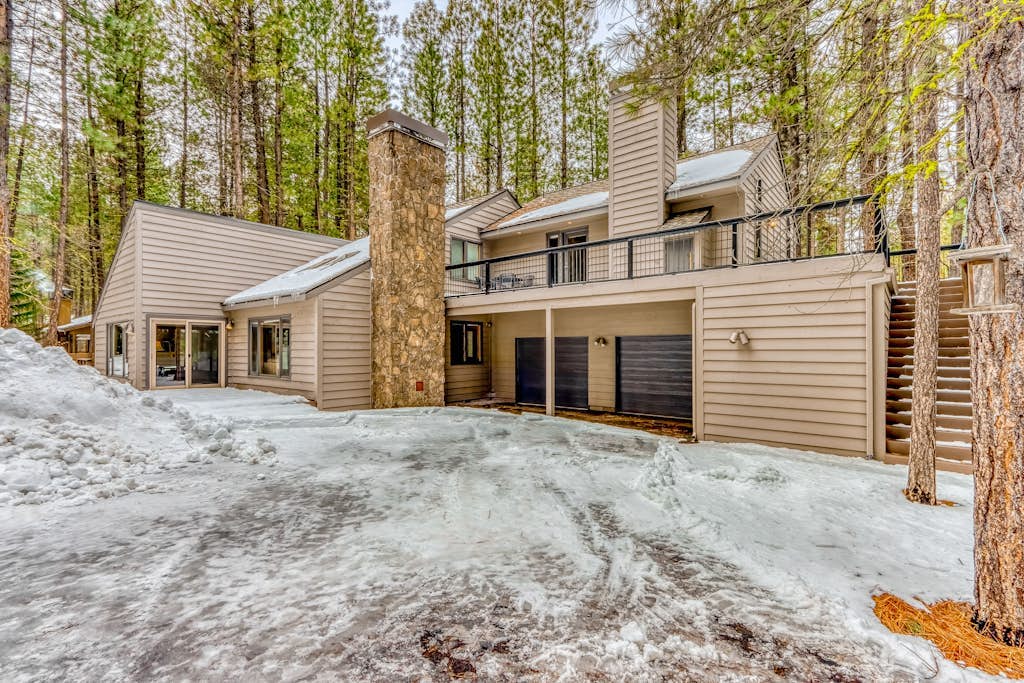 All-season resort home with on-site pool, hot tub, gym, golf, & fireplaces