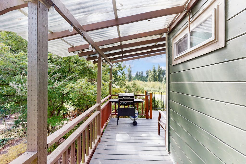 Dog-friendly, riverfront home with WiFi, deck & private washer/dryer