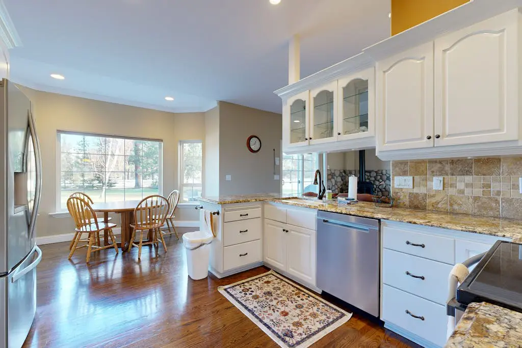 Tree-lined retreat with a hot tub, grill, game room, & W/D - mountain views