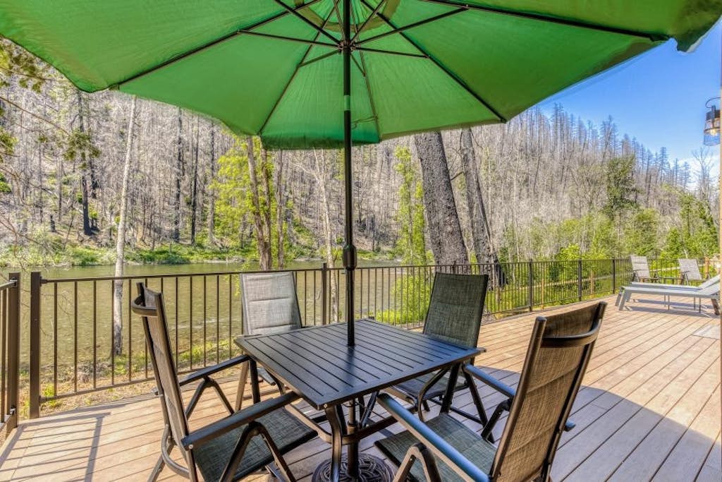Amazing riverfront cabin with views, deck, firepit, & grill - dog-friendly