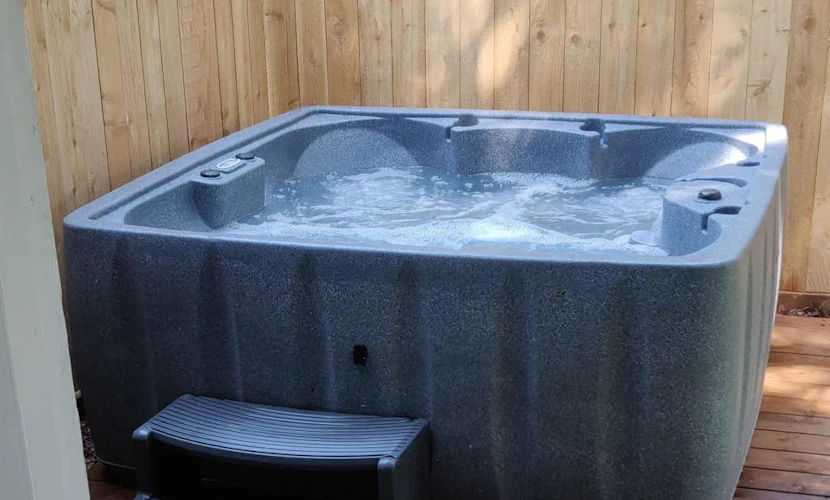 Dog-friendly home near the beach - private hot tub, wood-burning fireplace & W/D