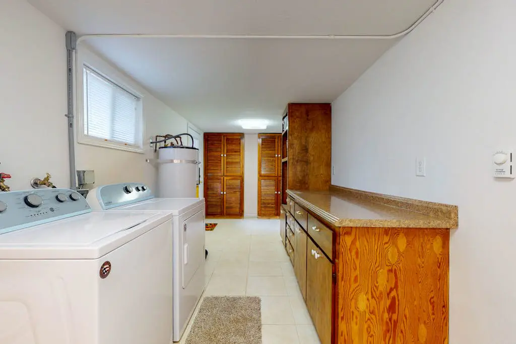 Dog-friendly home near the beach - private hot tub, wood-burning fireplace & W/D