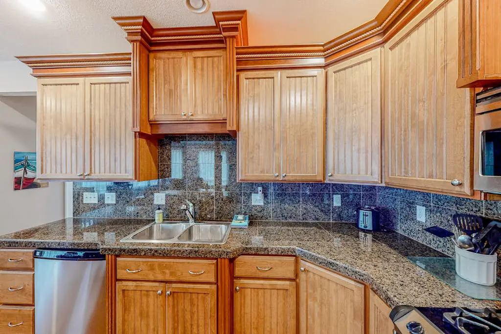 Dog-friendly sound-front cottage with fireplace, deck, lawn, beach access, & W/D