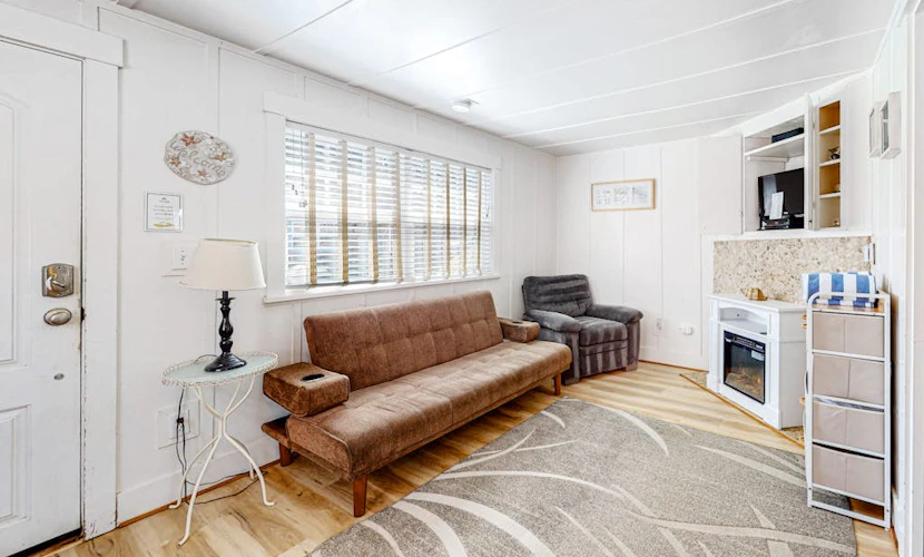 Colorful, Dog-Friendly Cottage with Free WiFi, Fireplace - Near Beach & Town