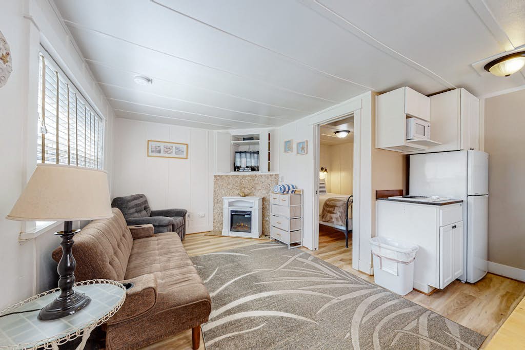 Colorful, Dog-Friendly Cottage with Free WiFi, Fireplace - Near Beach & Town