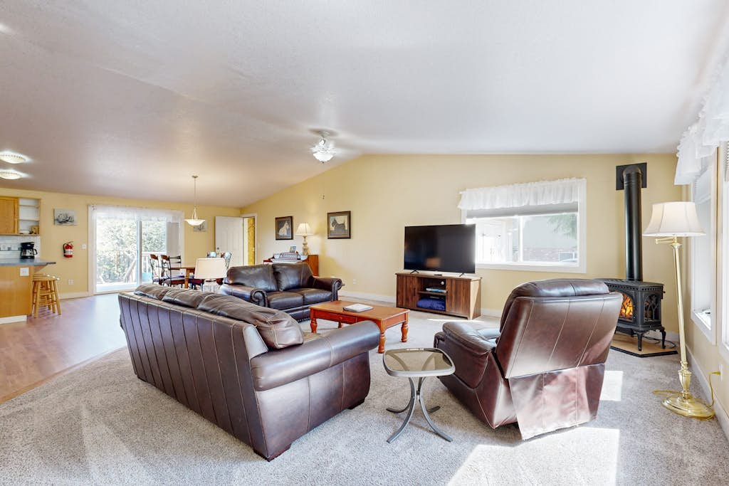 Charming home near ocean with patio, firepit, WiFi, streaming, and wood stove