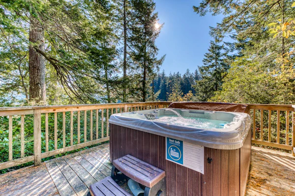 Dog-Friendly Home with Expansive Deck with Hot Tub and Dock on Woahink Lake