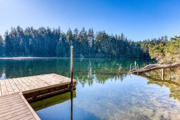 Dog-Friendly Home with Expansive Deck with Hot Tub and Dock on Woahink Lake