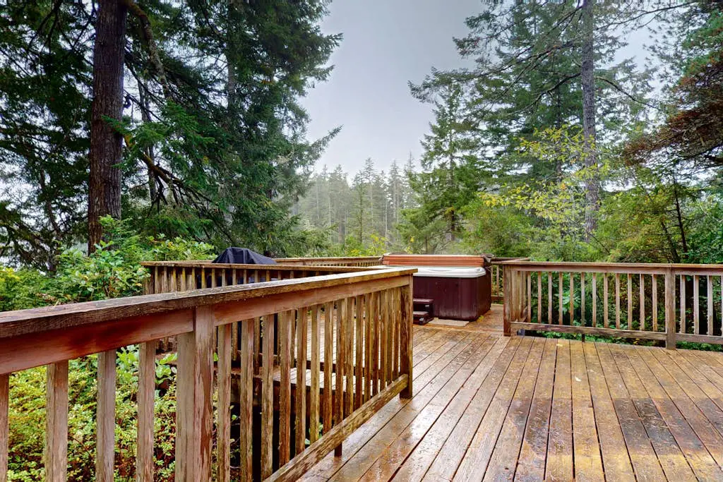 Dog-Friendly Home with Expansive Deck with Hot Tub and Dock on Woahink Lake