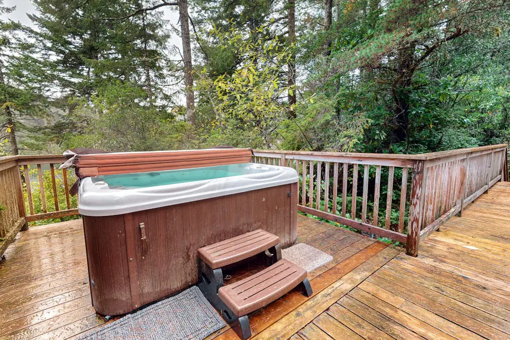 Dog-Friendly Home with Expansive Deck with Hot Tub and Dock on Woahink Lake