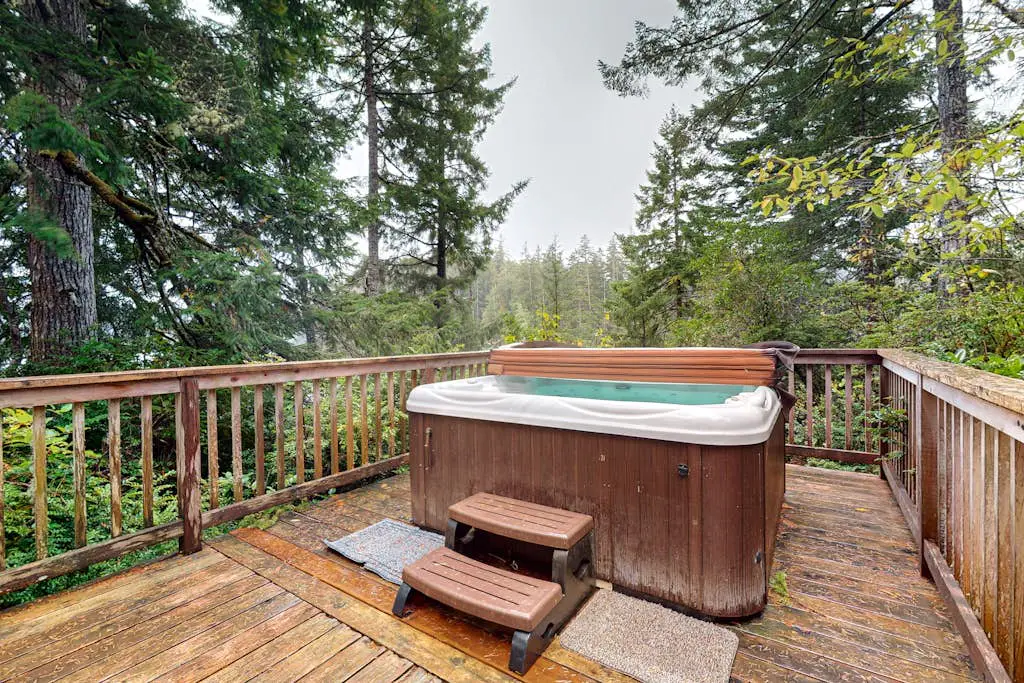 Dog-Friendly Home with Expansive Deck with Hot Tub and Dock on Woahink Lake