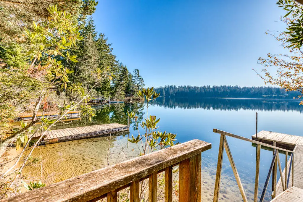 Dog-Friendly Home with Expansive Deck with Hot Tub and Dock on Woahink Lake