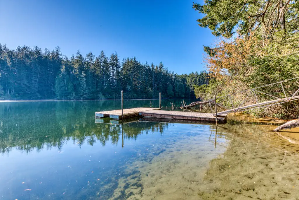 Dog-Friendly Home with Expansive Deck with Hot Tub and Dock on Woahink Lake