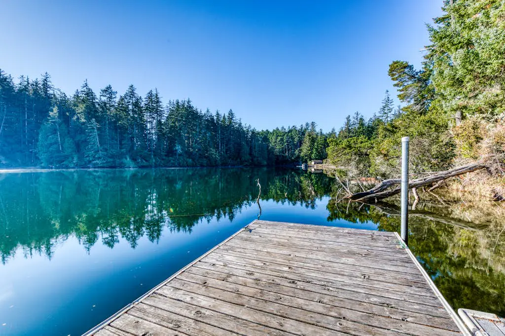 Dog-Friendly Home with Expansive Deck with Hot Tub and Dock on Woahink Lake