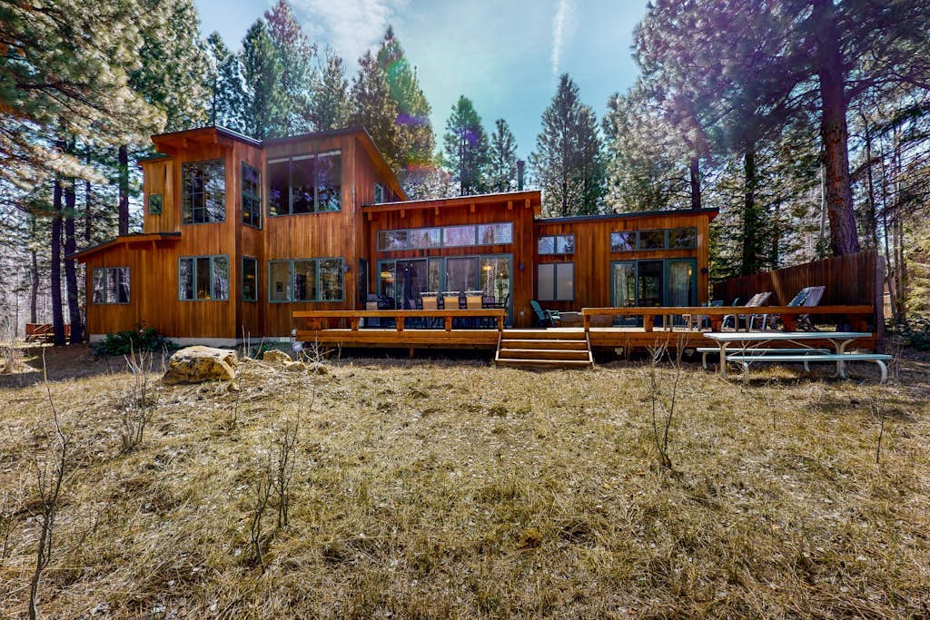 Tree-lined home with private hot tub, resort pools, hot tubs, & gym