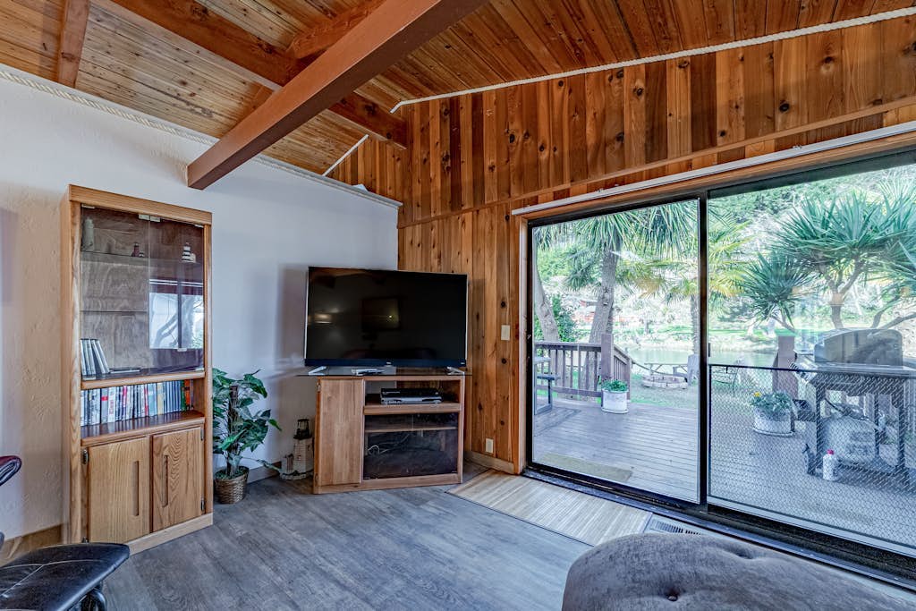 Riverfront Home near the Ocean with Private Hot Tub, Firepit, WiFi - 2 Dogs OK