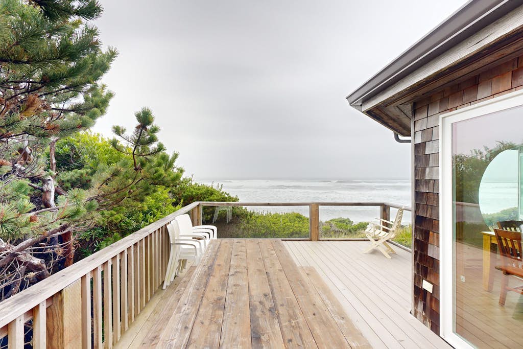Stunning beachfront home with sweeping ocean views, firepit, fireplace, balcony