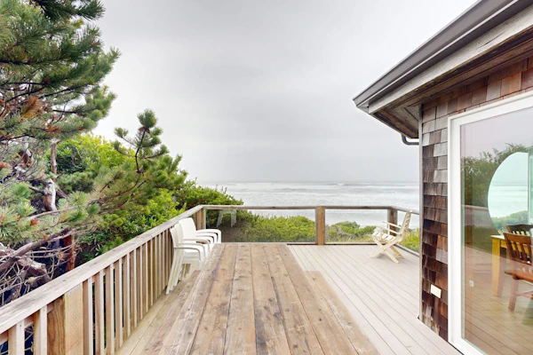 Stunning beachfront home with sweeping ocean views, firepit, fireplace, balcony