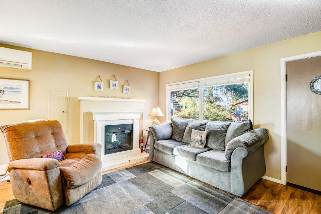 Updated Dog-Friendly Cottage with Outdoor Firepit, Five Blocks from the Beach