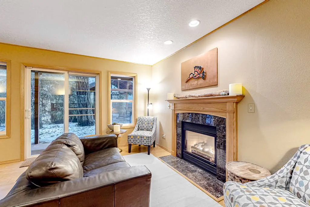 Dog-friendly home with hot tub, shared pool, firepit, fireplace, & river access