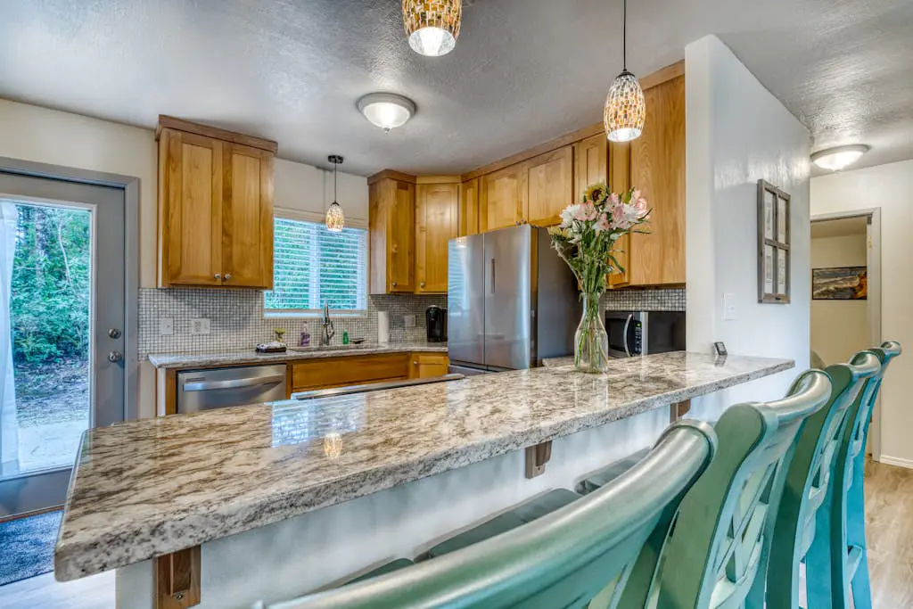 Single-level, dog-friendly home w/ private fenced-in yard & easy beach access