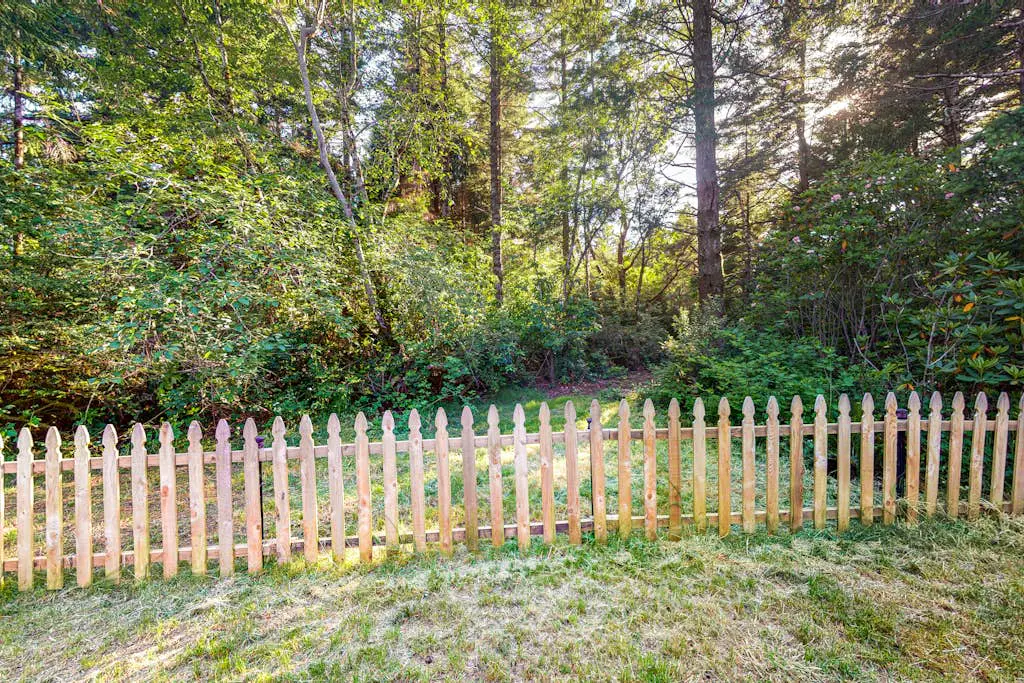 Single-level, dog-friendly home w/ private fenced-in yard & easy beach access