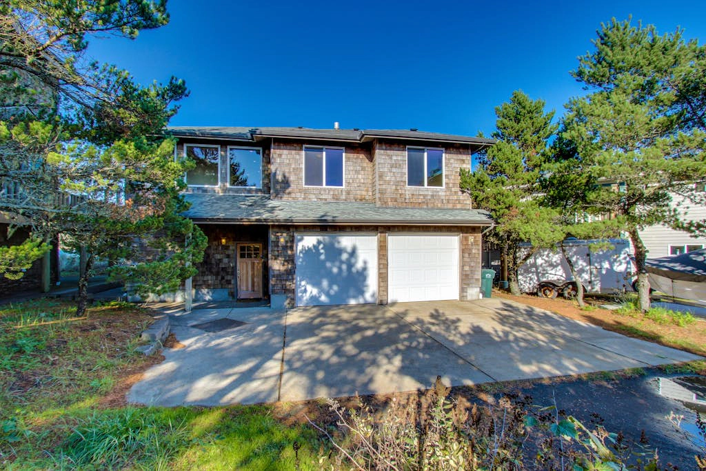 Walk to Oregon Coast Aquarium from this modern, dog-friendly, oceanview home