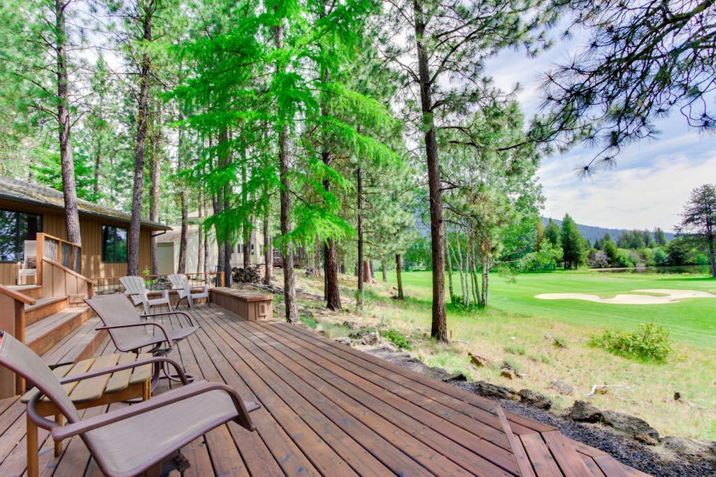 Resort home with pool, hot tub, three-tier decks, & golf course views