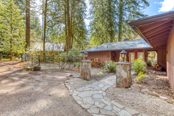Dog-friendly, riverfront home w/ a wood-burning fireplace & views