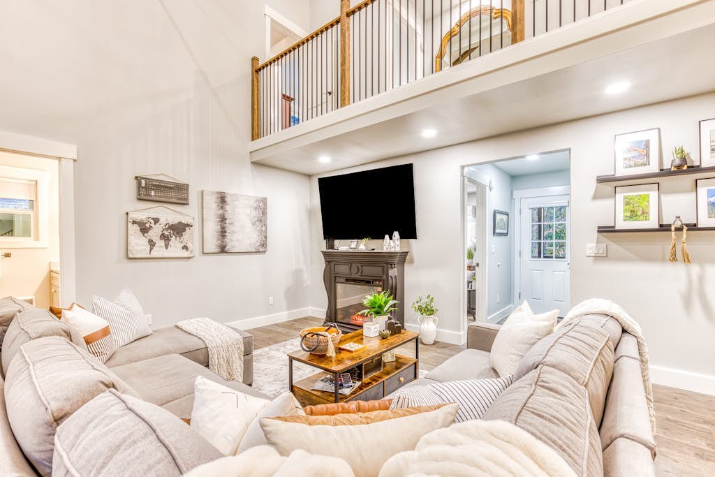 Inviting home with fireplace, sauna, full kitchen, & W/D