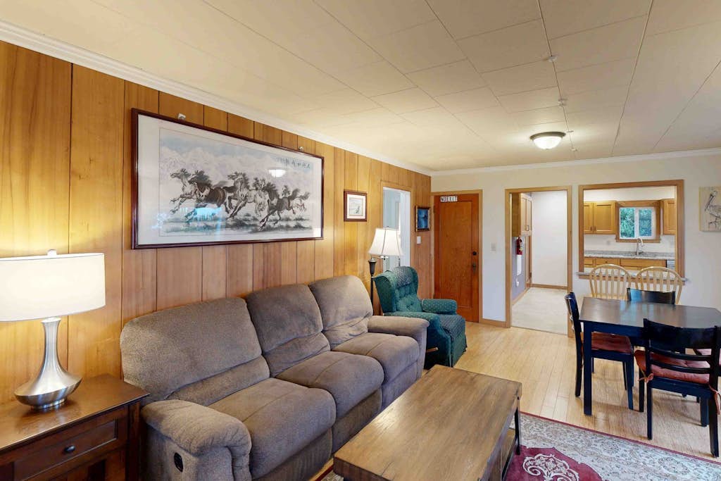 Comfy duplex with peekaboo ocean views, private hot tub, & easy beach access