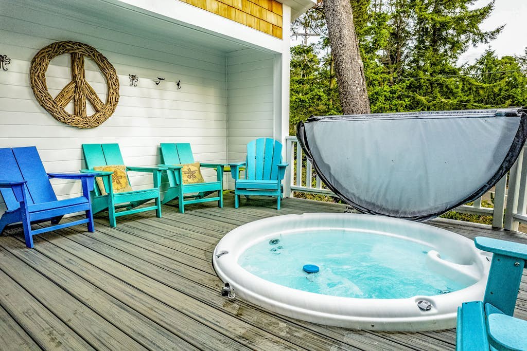 Classic, dog-friendly beach house with vast outdoor living, hot tub & firepit