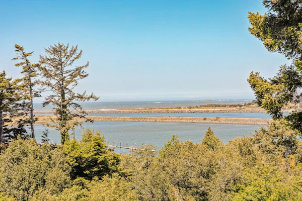 Charming coastal home with water views, large covered deck