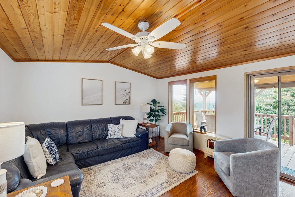 Coastal condo with stunning views, a cozy loft, private deck and hot tub