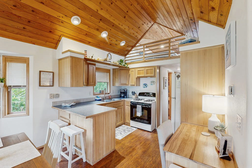 Coastal condo with stunning views, a cozy loft, private deck and hot tub