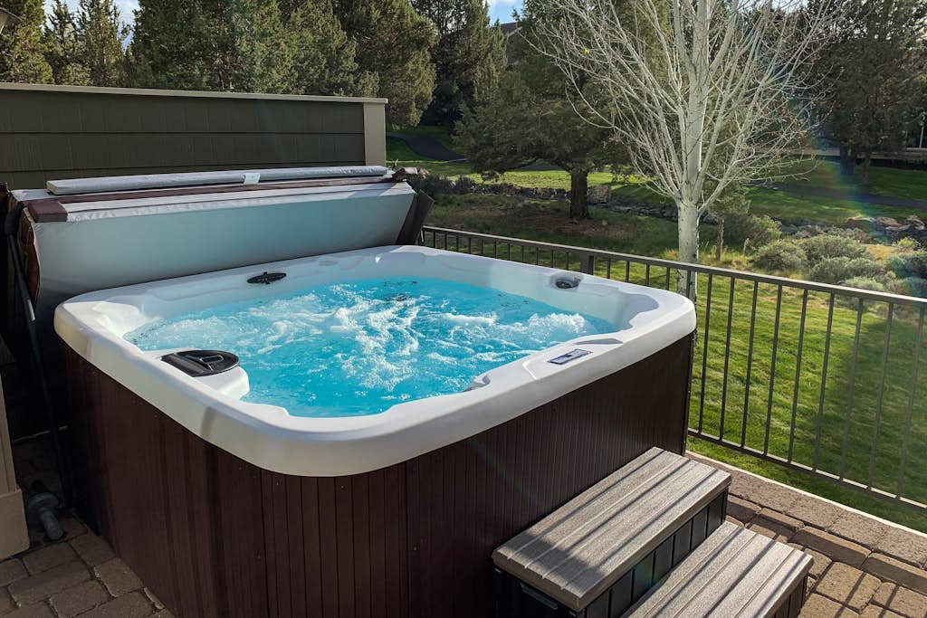 Creekside home with private hot tub & fireplace - access to pools, hot tub, gym